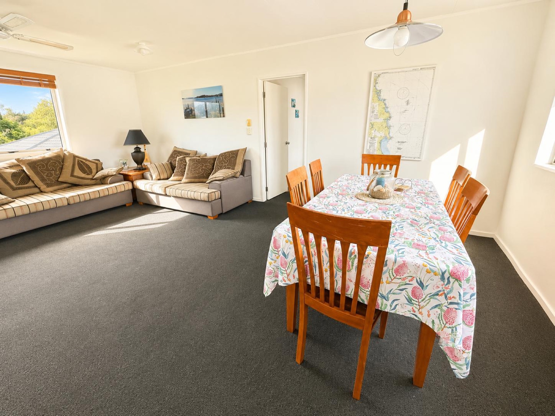Bright open-plan upstairs lounge, dining and kitchen