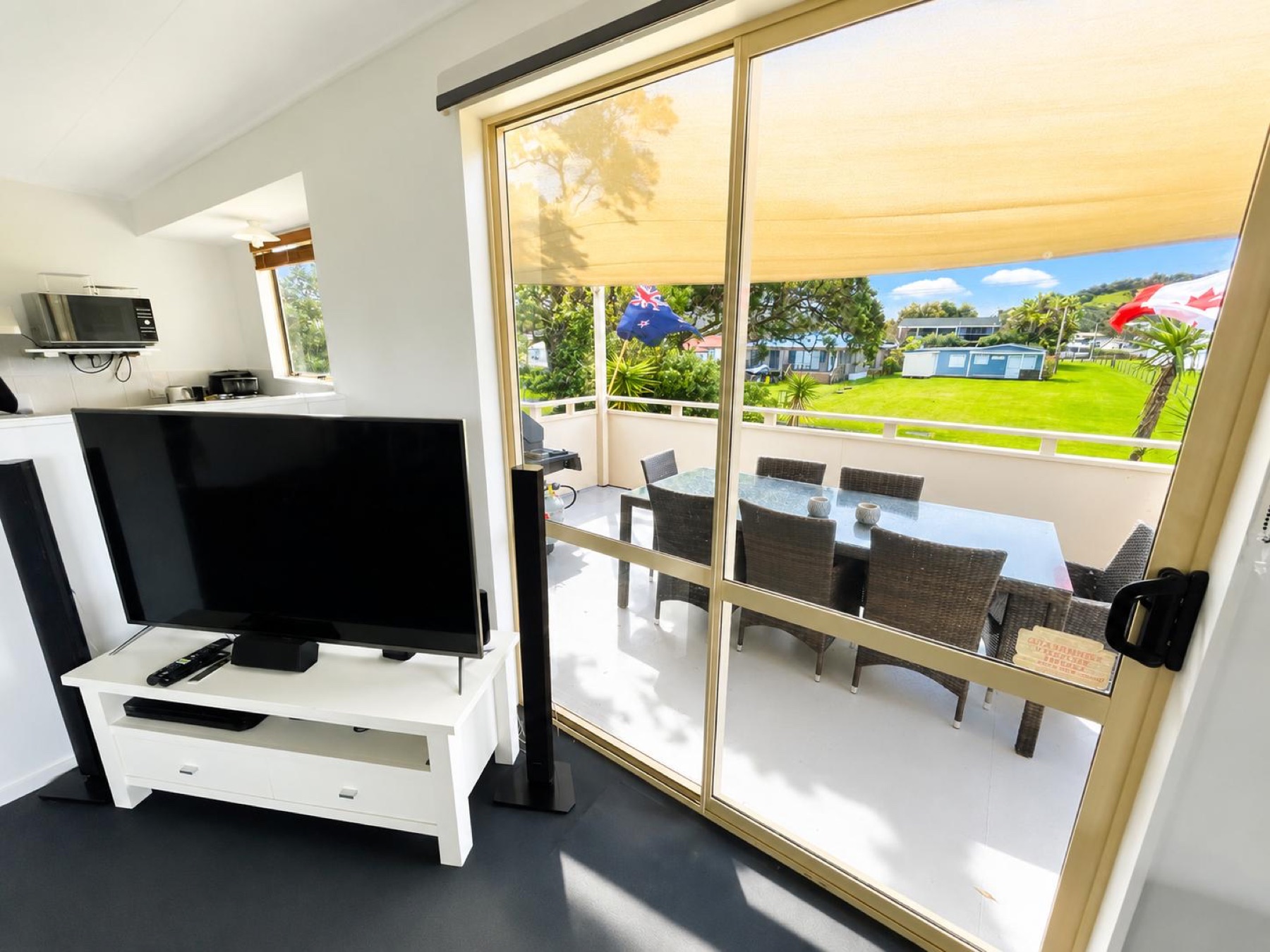 Lounge opening directly to the covered upper deck