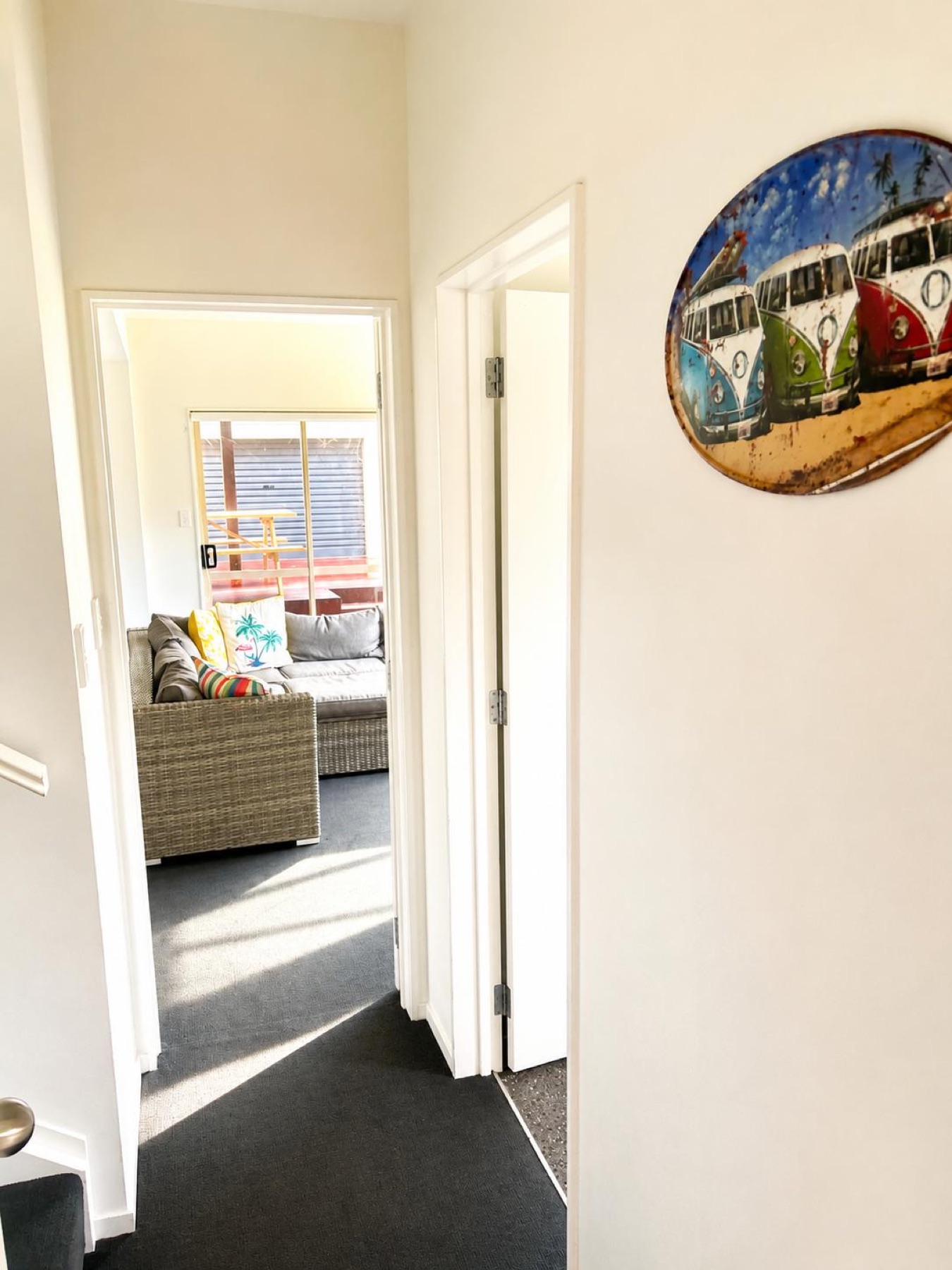 Ground-floor hallway connecting the apartment and garage